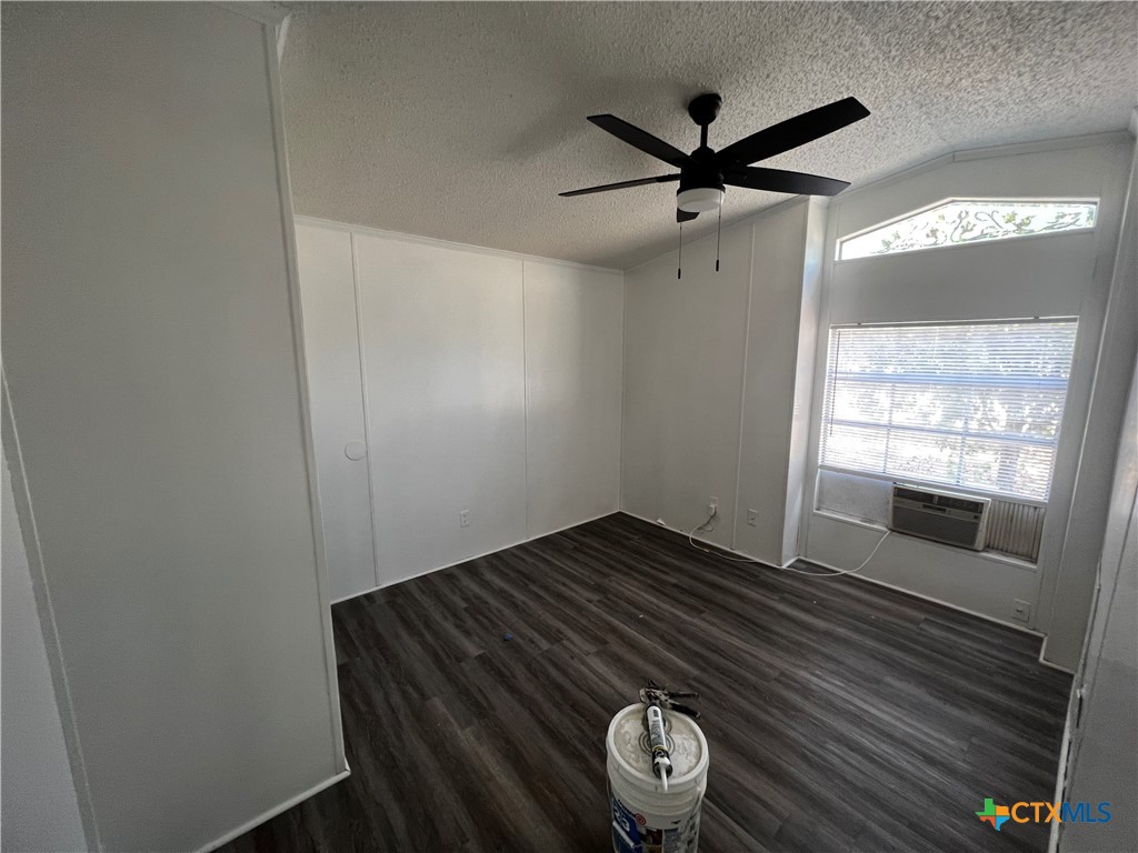 1405 Harris Hill Road, Unit 1405 San Marcos, TX 78666 - Photo 9 of 14 a view of an empty room with a window