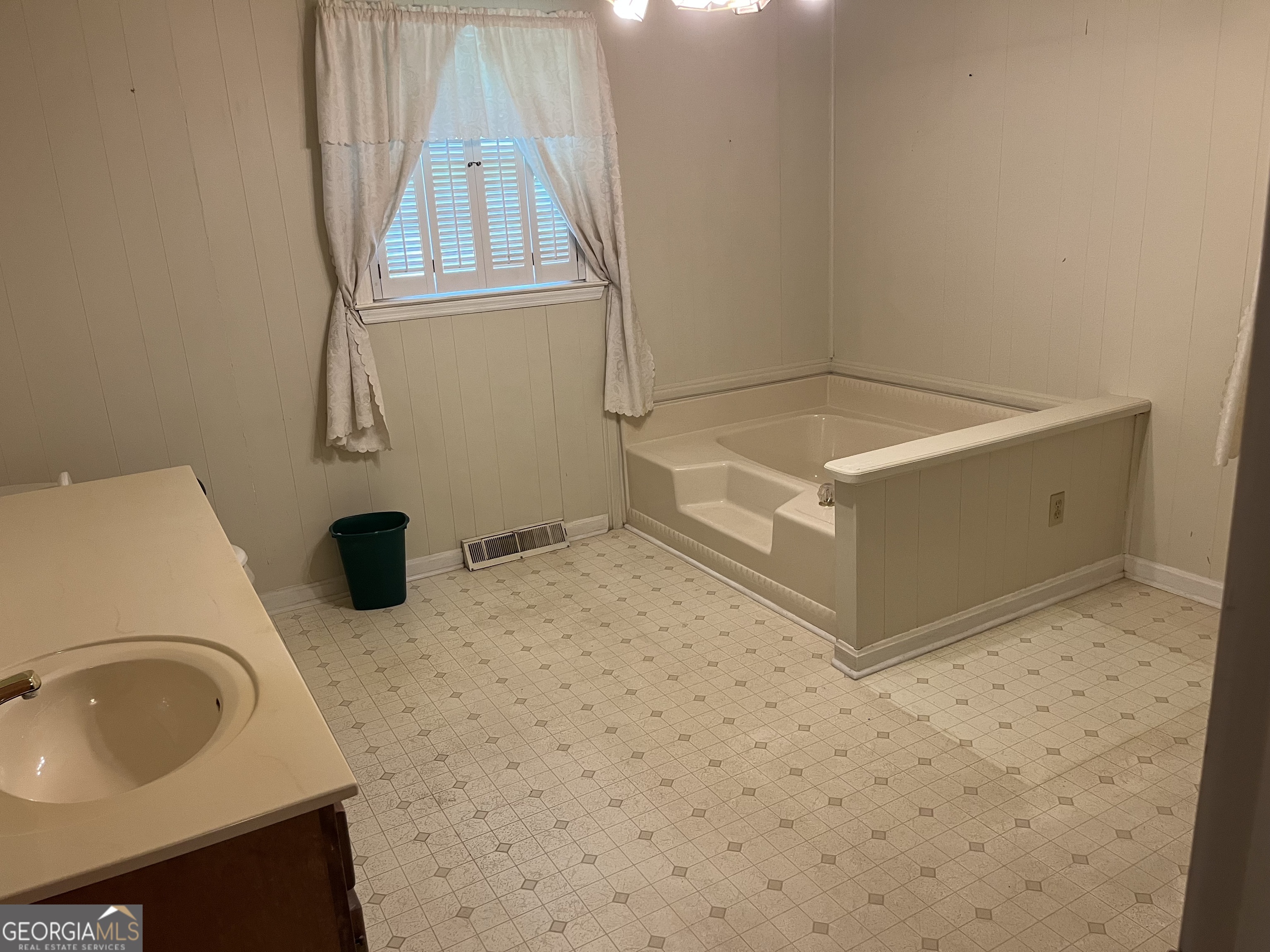 30 Highway 411 Street Southeast Cave Spring, GA 30124 - Photo 8 of 12 a bathroom with a sink a vanity and mirror