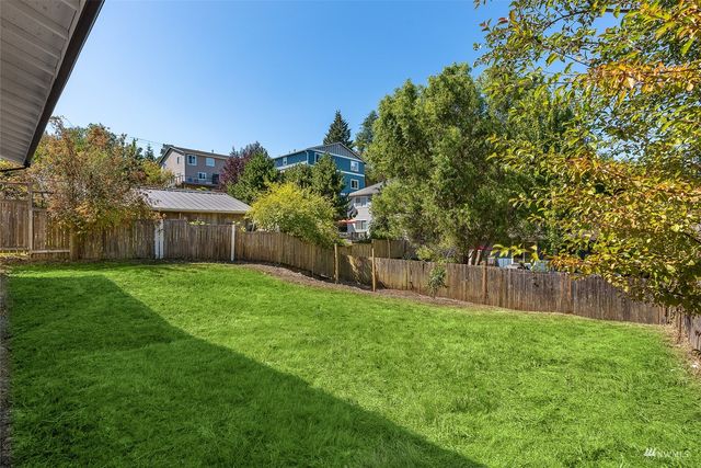 a view of a city with mountains in the background
