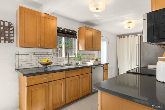a bedroom with bed and a cabinets