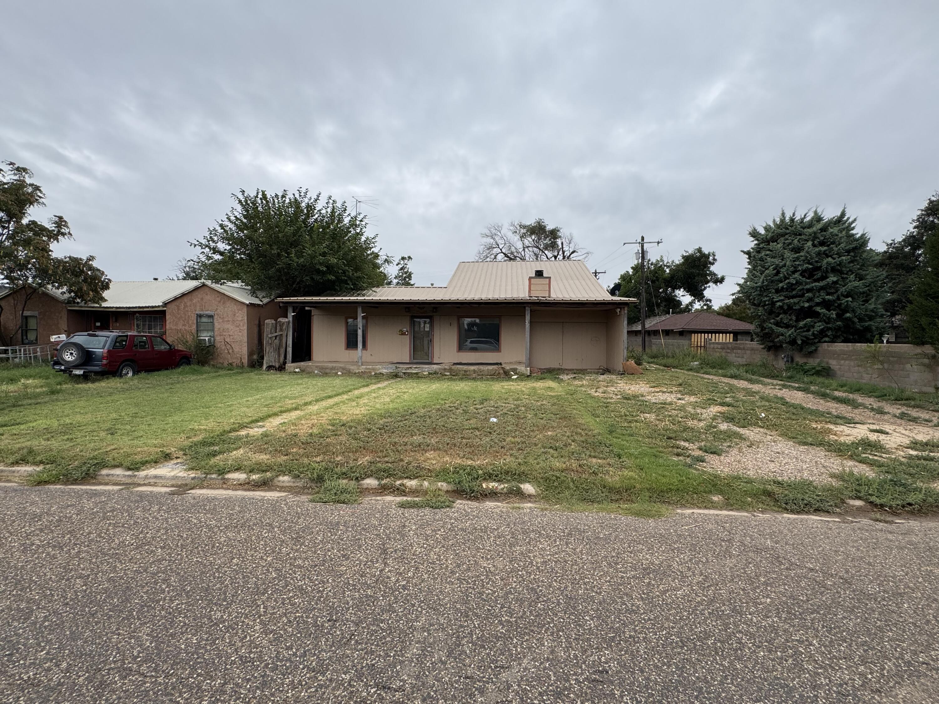 108 Southeast 10th Plainview, TX 79072 - Photo 1 of 21 a view of a house with a yard