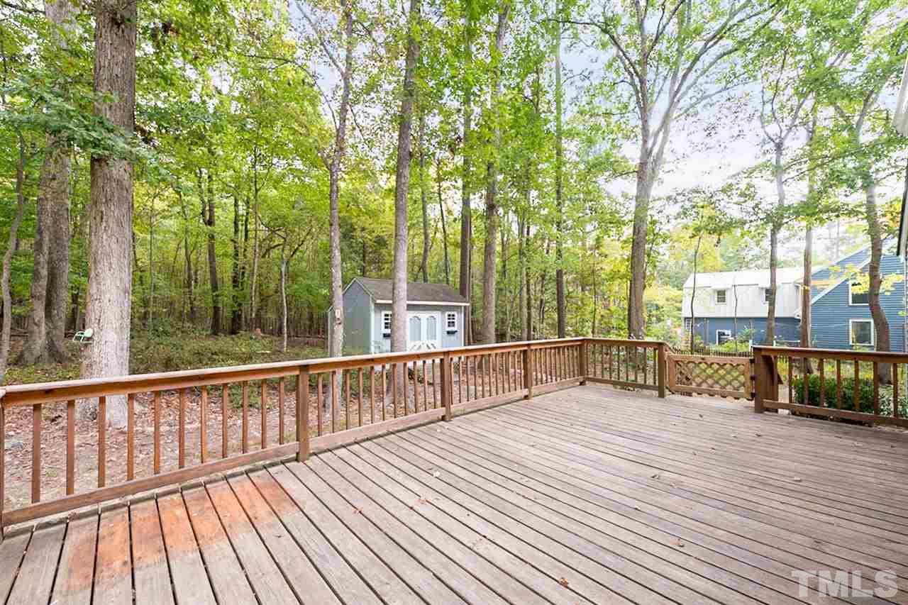 5208 Hallmark Road Durham, NC 27712 - Photo 22 of 25 a view of backyard with deck and outdoor seating