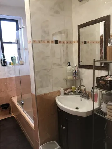a bathroom with a sink and a bathtub
