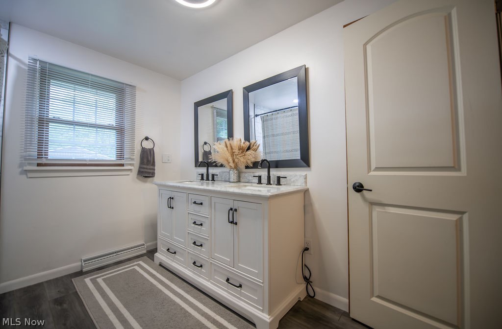827 East 5th Street Dover, OH 44622 - Photo 26 of 38 View of full bath area on upper level featuring double vanity