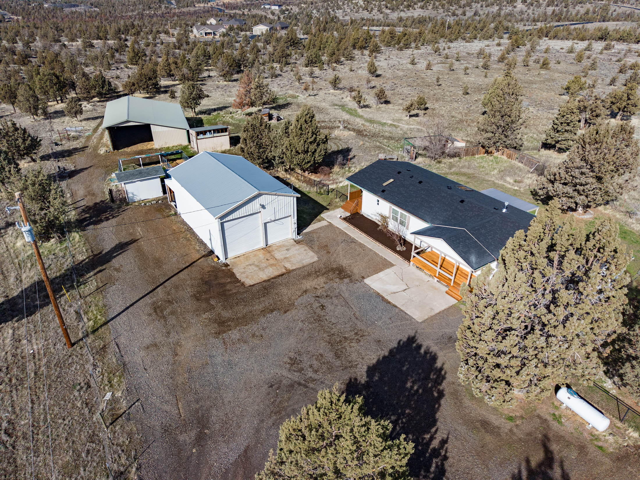10113 Ridgeview Road Prineville, OR 97754 - Photo 26 of 31 an aerial view of a house with a yard