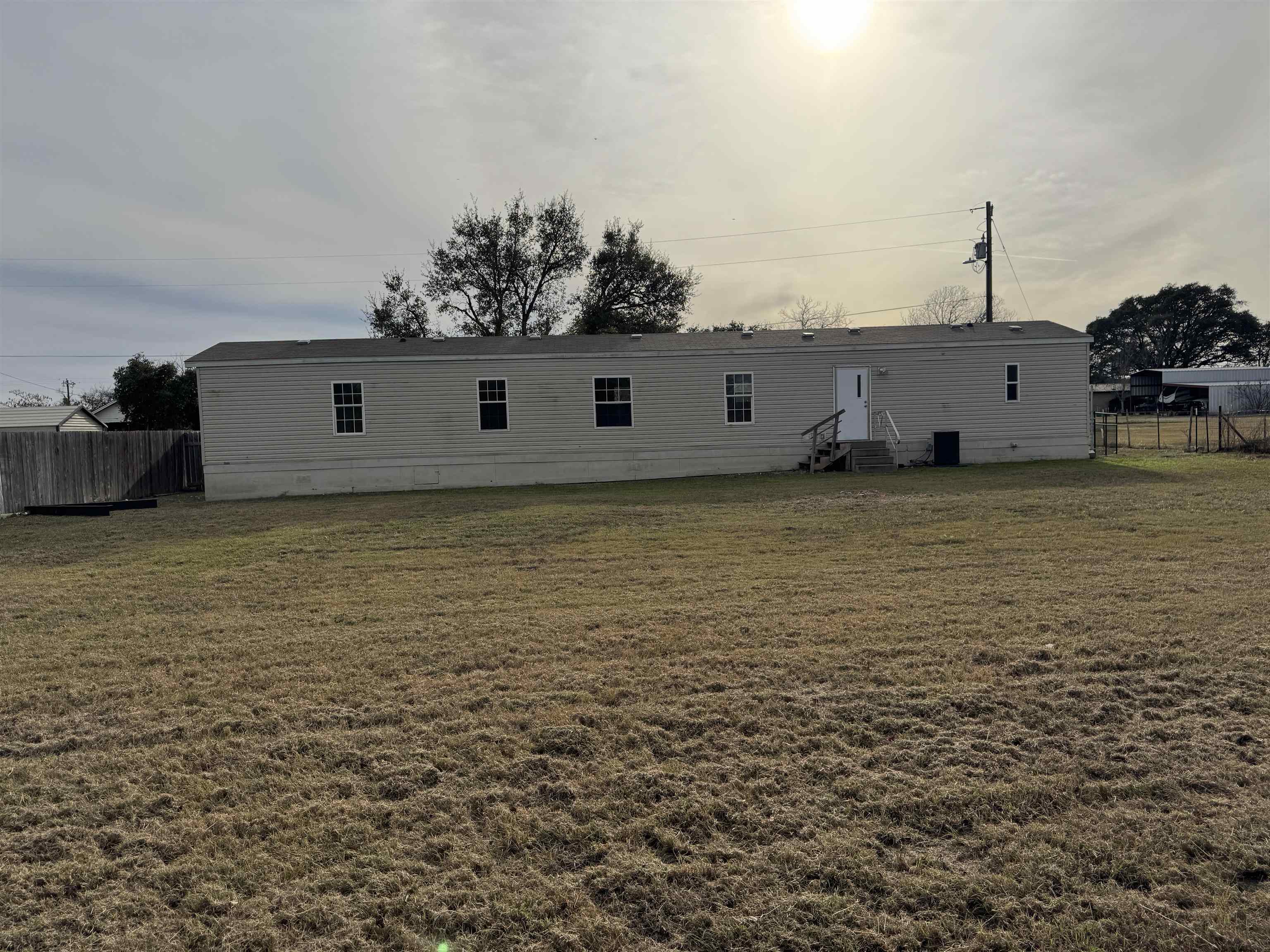42 Reed Circle Bertram, TX 78605 - Photo 23 of 28 a house view with a outdoor space