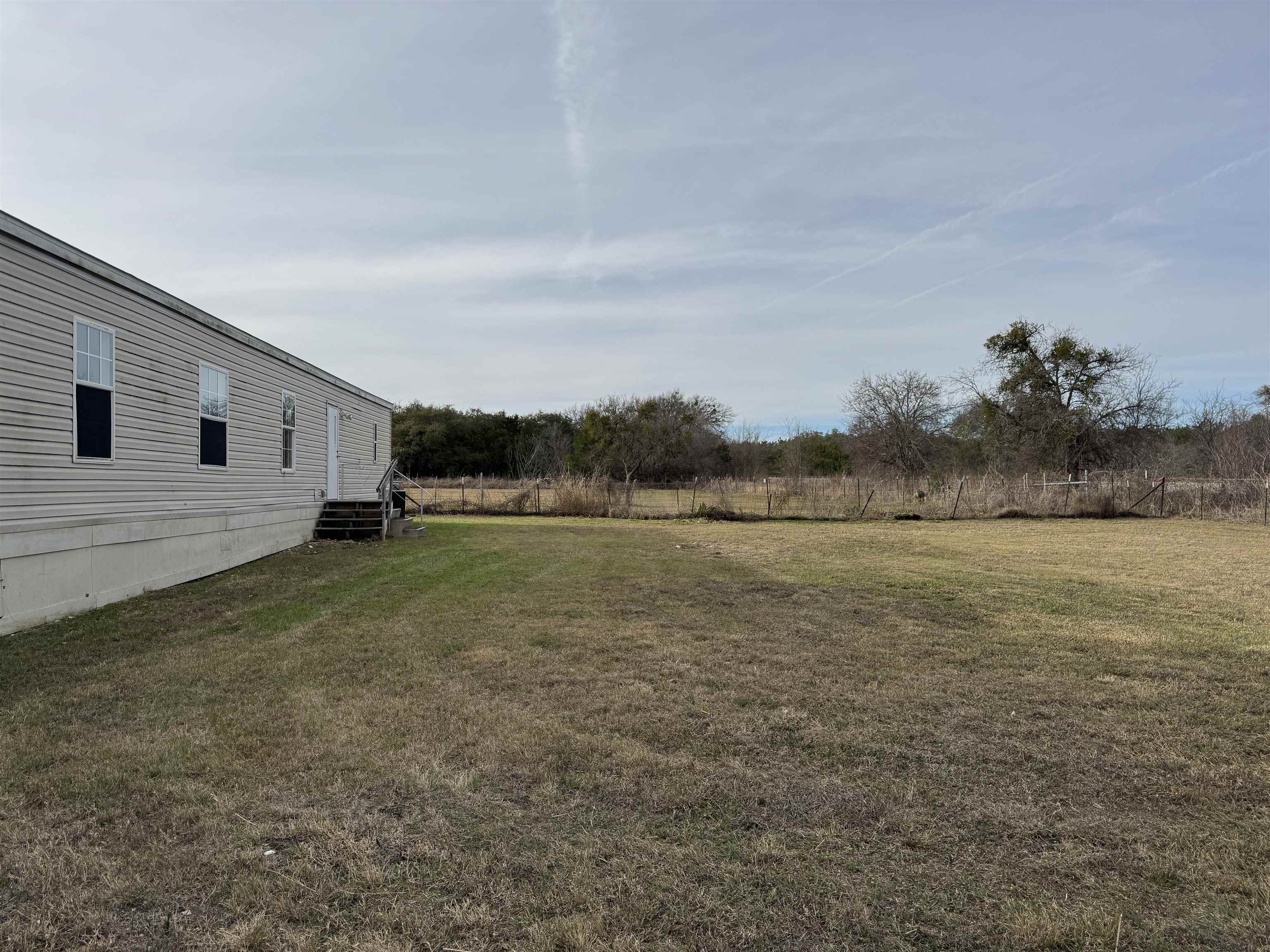 42 Reed Circle Bertram, TX 78605 - Photo 26 of 28 a view of a backyard