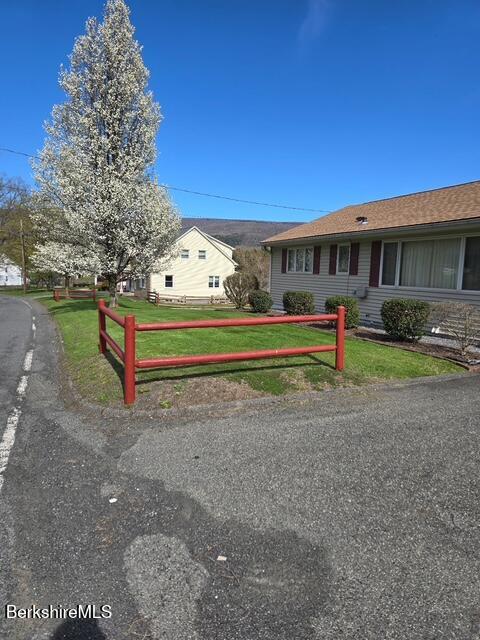 148 Friend Street Adams, MA 01220 - Photo 28 of 28 a front view of a house with a yard