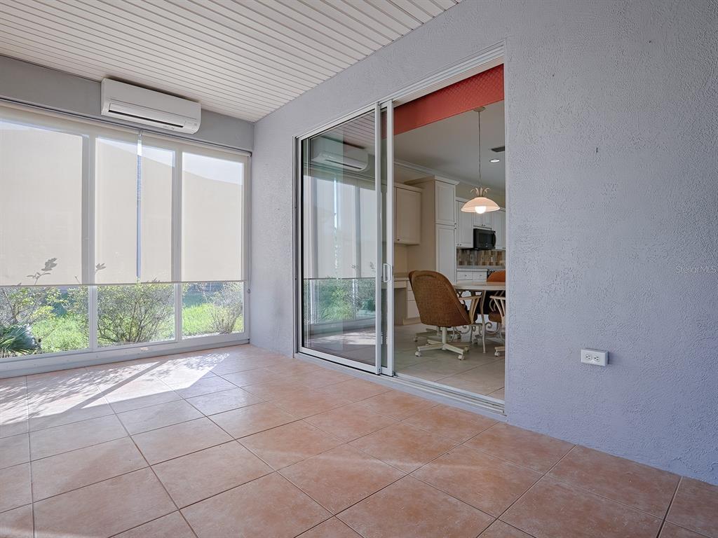 13007 Southeast 90th Court Road Summerfield, FL 34491 - Photo 35 of 78 Enclosed Lanai