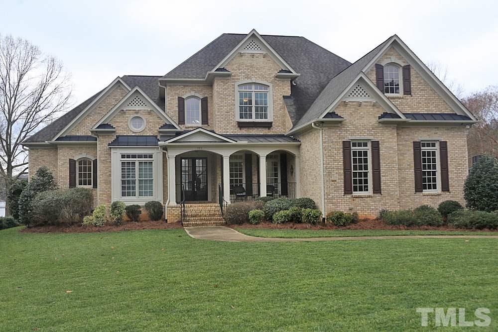 103 Duckhead Point Cary, NC 27518 - Photo 1 of 25 a front view of a house with garden