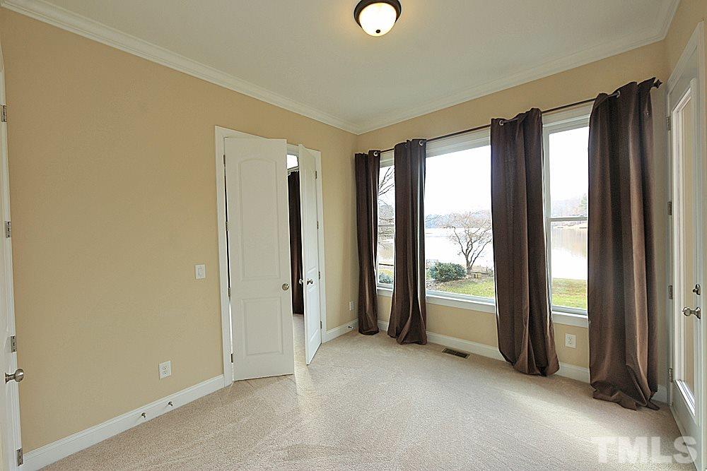 103 Duckhead Point Cary, NC 27518 - Photo 13 of 25 an empty room with windows and view of bedroom