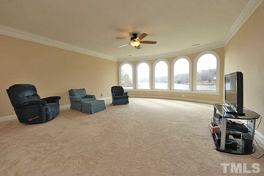 103 Duckhead Point Cary, NC 27518 - Photo 18 of 25 a room with gym equipment and a large window