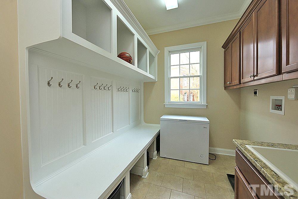 103 Duckhead Point Cary, NC 27518 - Photo 8 of 25 a room with a stove and a cabinet