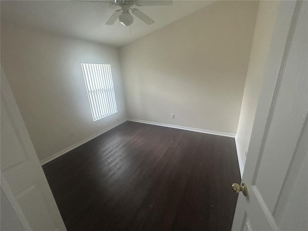 1332 Hatcher Loop Drive Brandon, FL 33511 - Photo 19 of 35 an empty room with a window