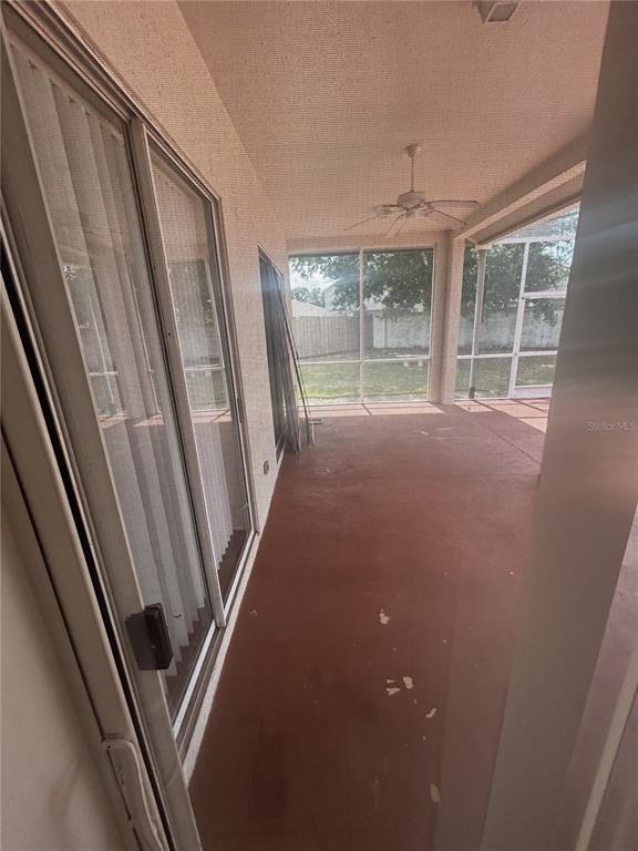 1332 Hatcher Loop Drive Brandon, FL 33511 - Photo 32 of 35 a view of an empty room with a fireplace