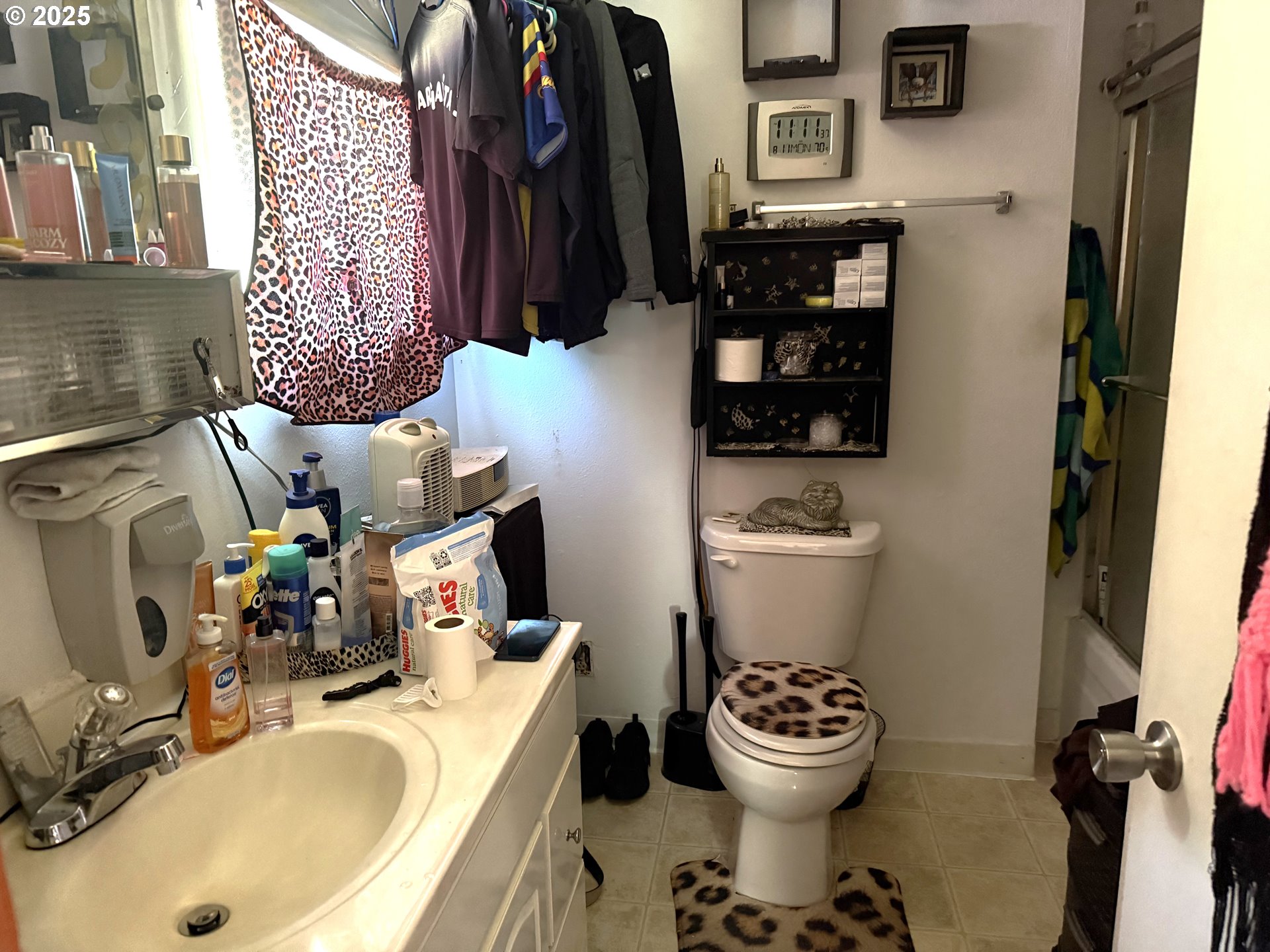 173 North 11th Street Coos Bay, OR 97420 - Photo 7 of 9 a bathroom with a sink toilet and a mirror