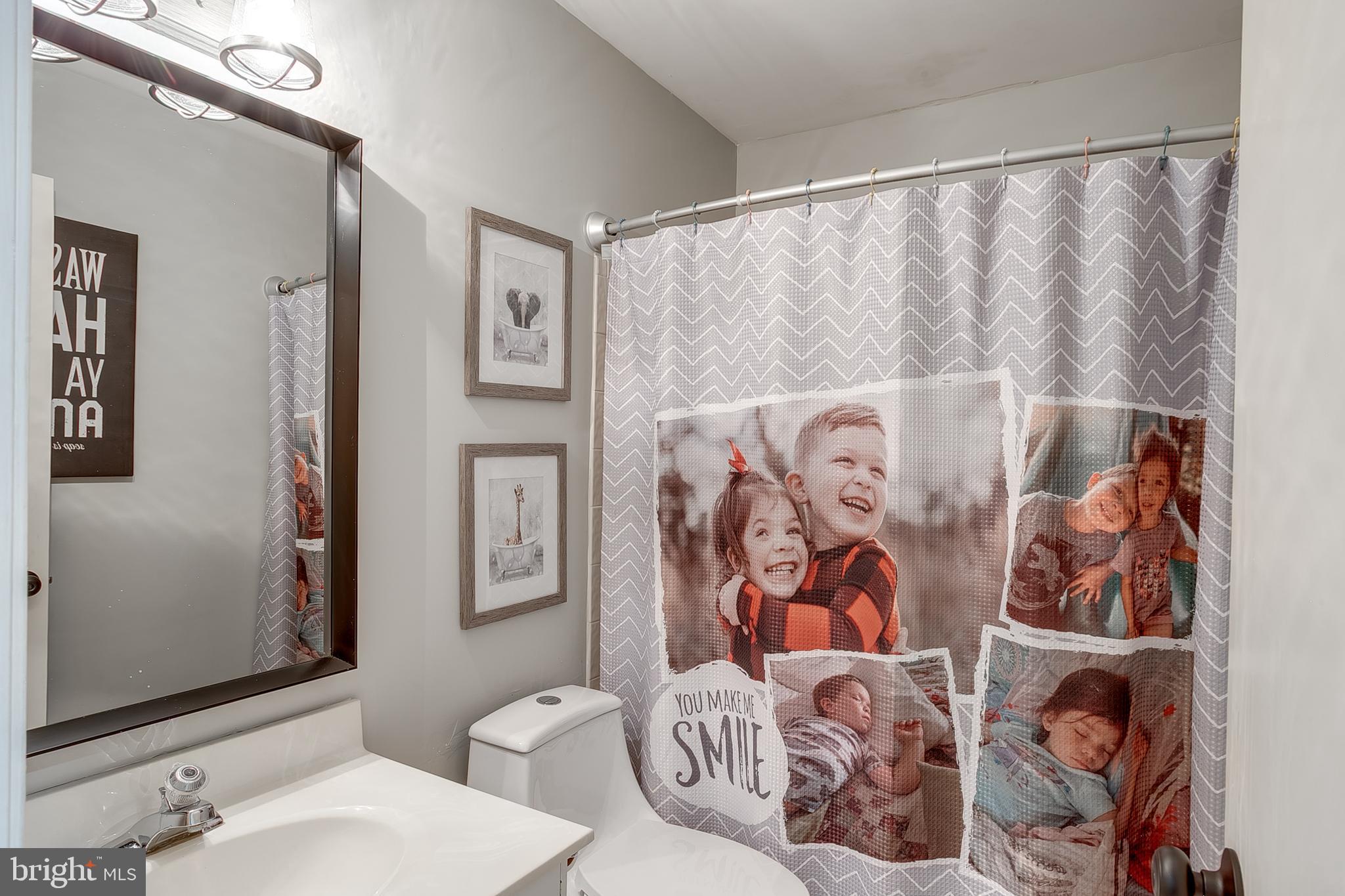 3 Crofton Commons Cherry Hill, NJ 08034 - Photo 14 of 24 a bathroom with a toilet and a shower curtain