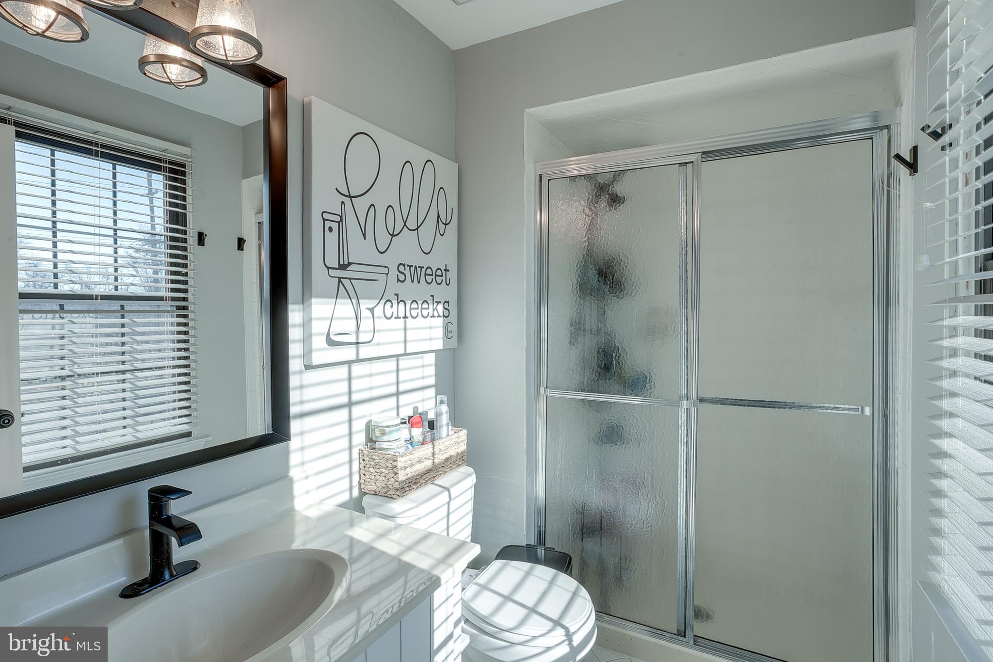 3 Crofton Commons Cherry Hill, NJ 08034 - Photo 18 of 24 a bathroom with a sink toilet and shower