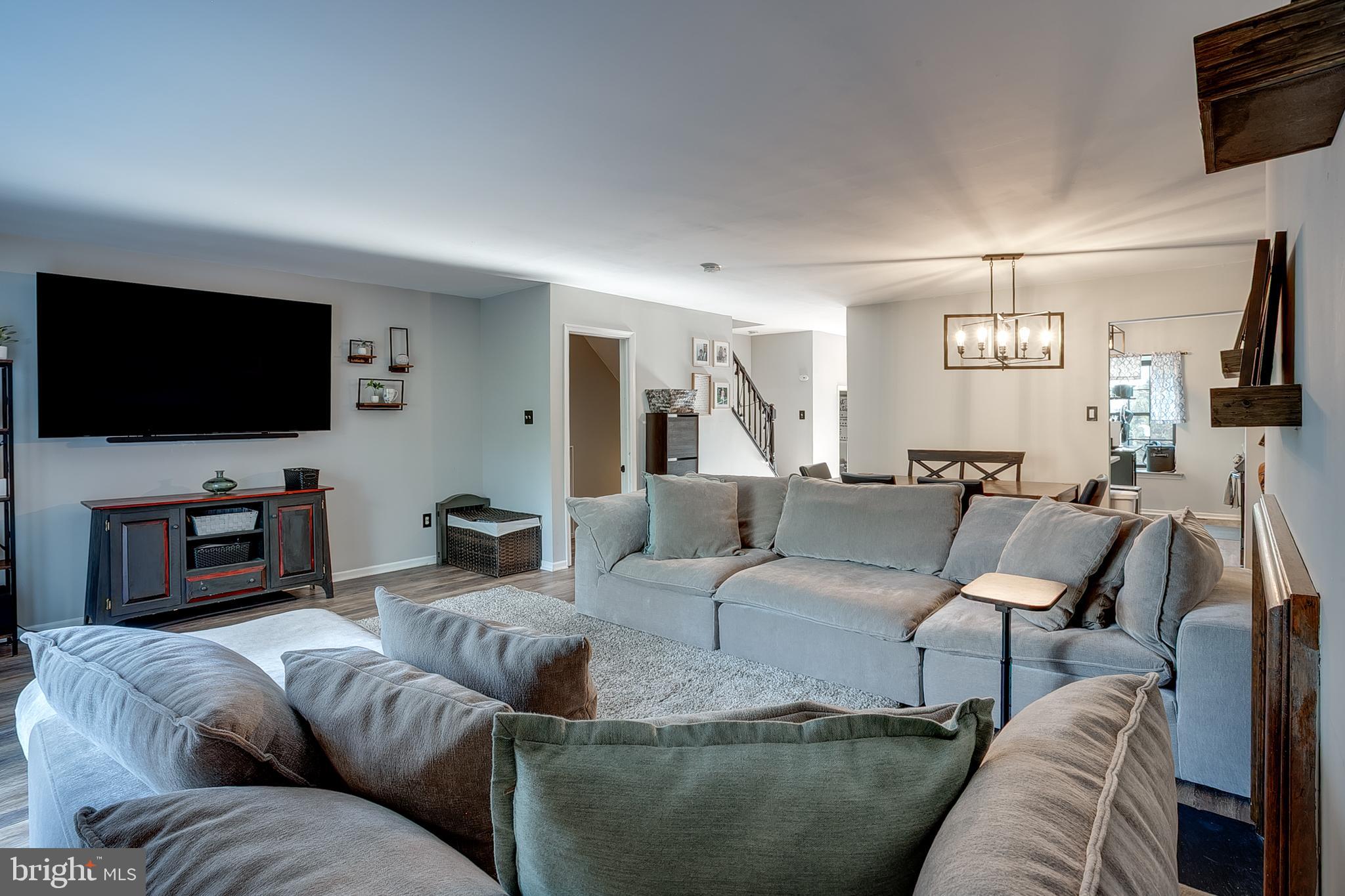 3 Crofton Commons Cherry Hill, NJ 08034 - Photo 2 of 24 a living room with furniture and a flat screen tv
