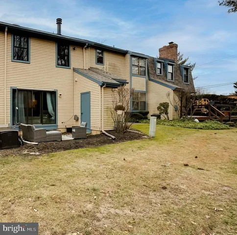 a view of a house with swimming pool