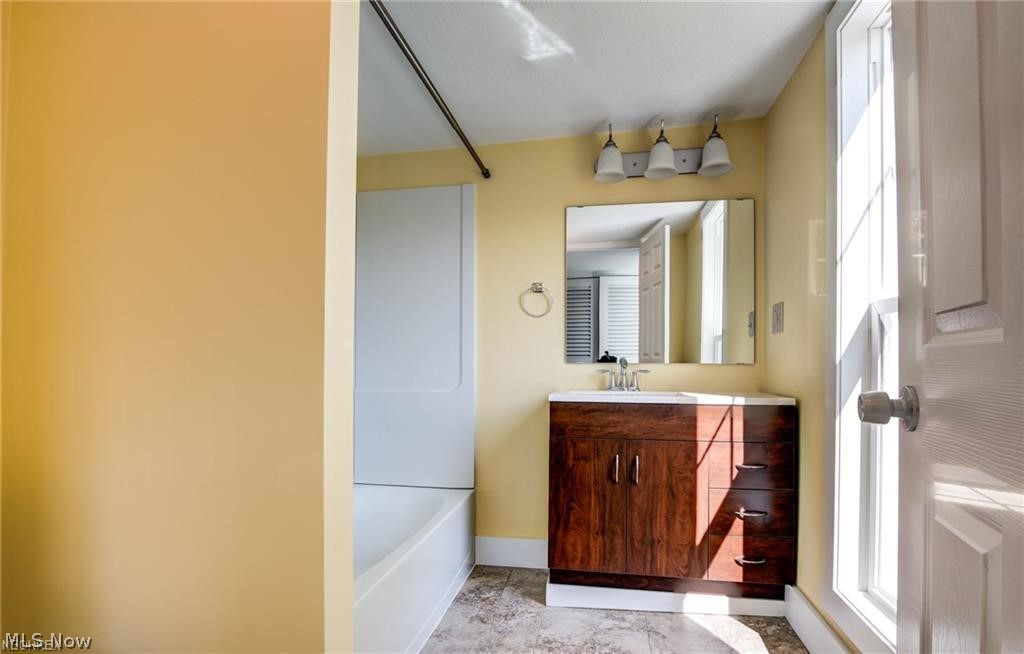 15201 Trask Road Thompson, OH 44086 - Photo 15 of 28 Updated Master bathroom - with full closet dressing area and huge bedroom