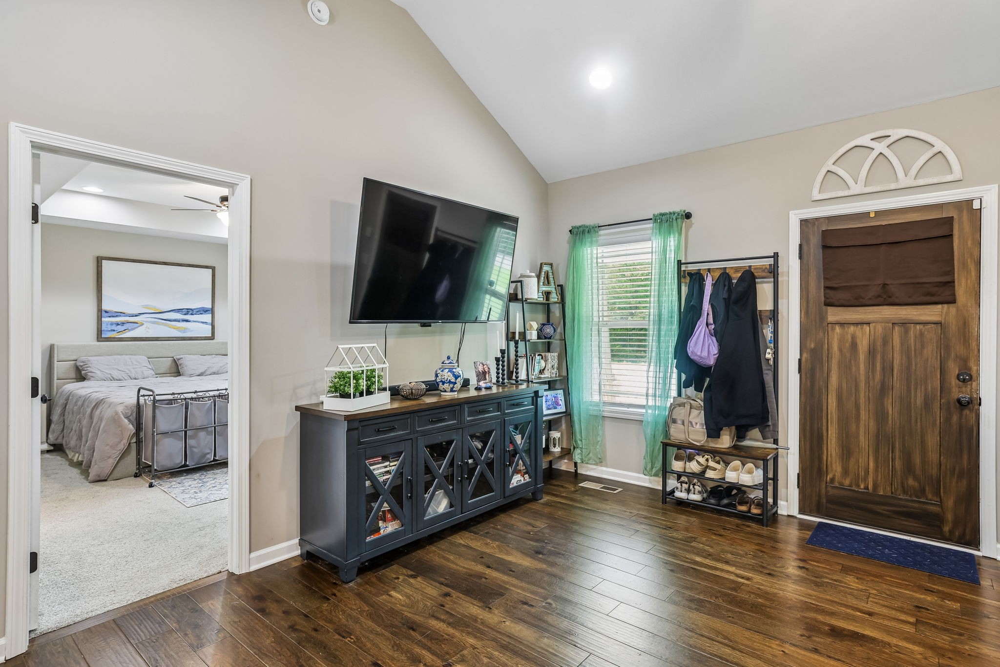 1546 South Spring Street Manchester, TN 37355 - Photo 16 of 53 a view of living room kitchen with furniture and flat screen tv