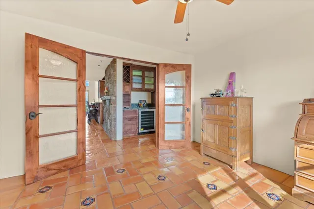 a view of an empty room with windows