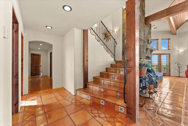 a kitchen with sink a refrigerator and a stove