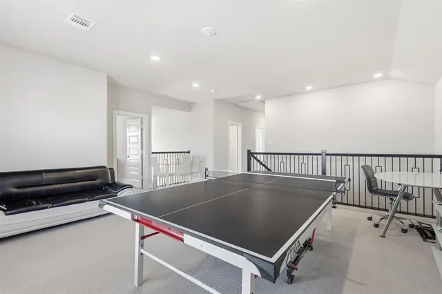 a bathroom with a double vanity sink a mirror and shower
