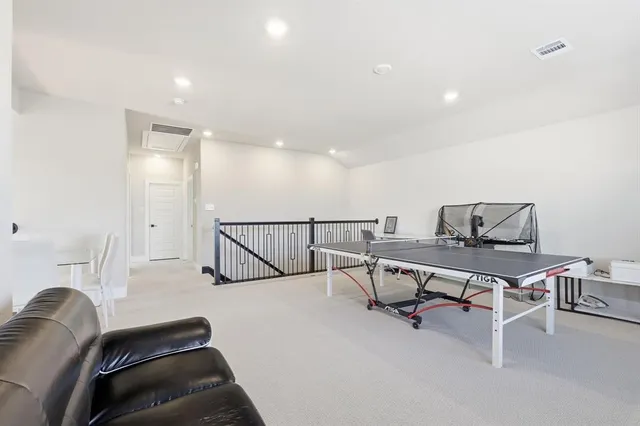 a view of a livingroom with furniture and a couch