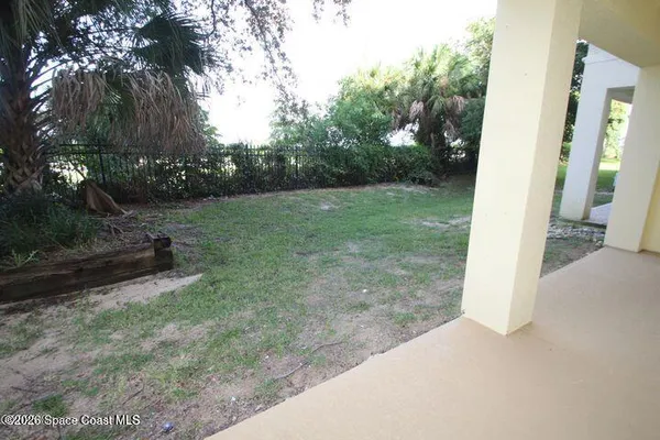 a view of backyard with green space