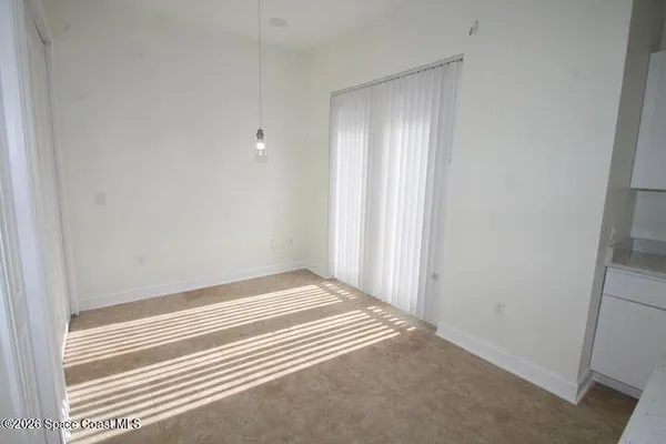 a view of a livingroom with an empty space