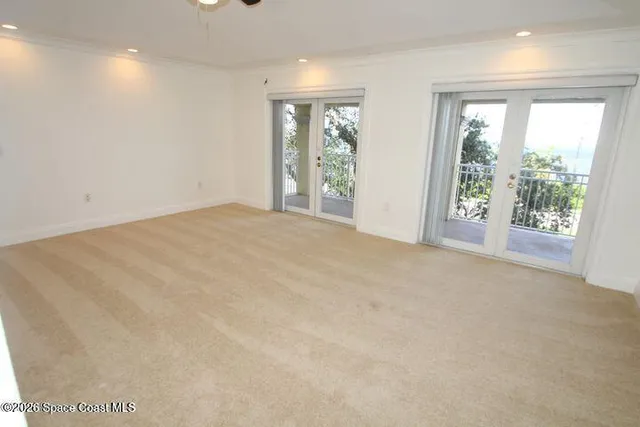 an empty room with windows