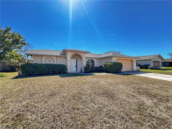 a house view with a garden space