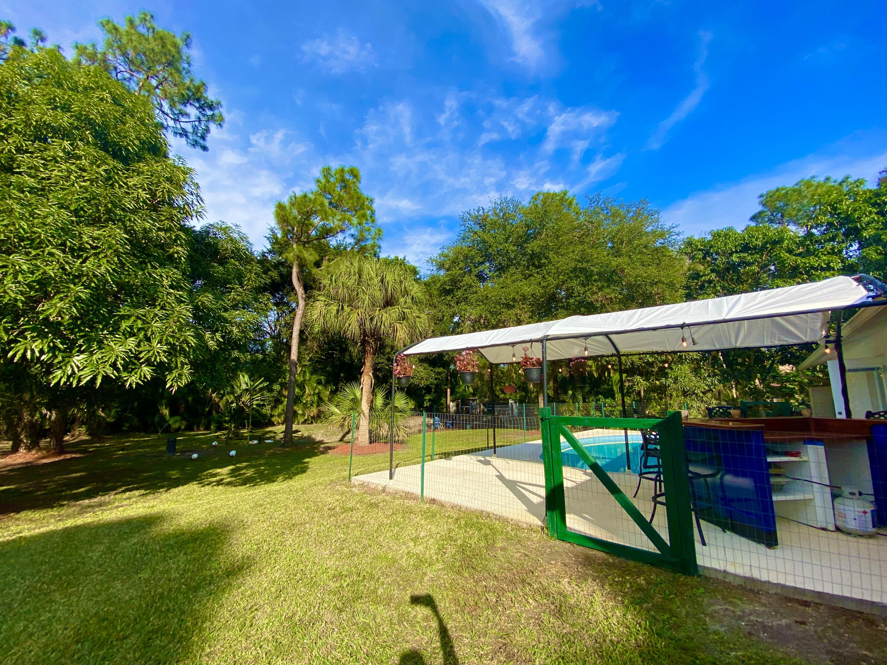 14705 76th Road North Loxahatchee, FL 33470 - Photo 88 of 99 238D4C6D-DD04-4553-8CBC-225D8D6FA418