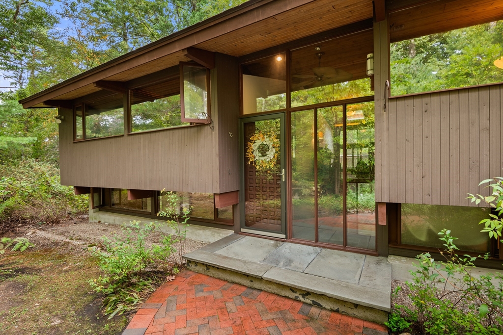 4 Plum Hill Manchester, MA 01944 - Photo 1 of 39 a view of a backyard with a garden