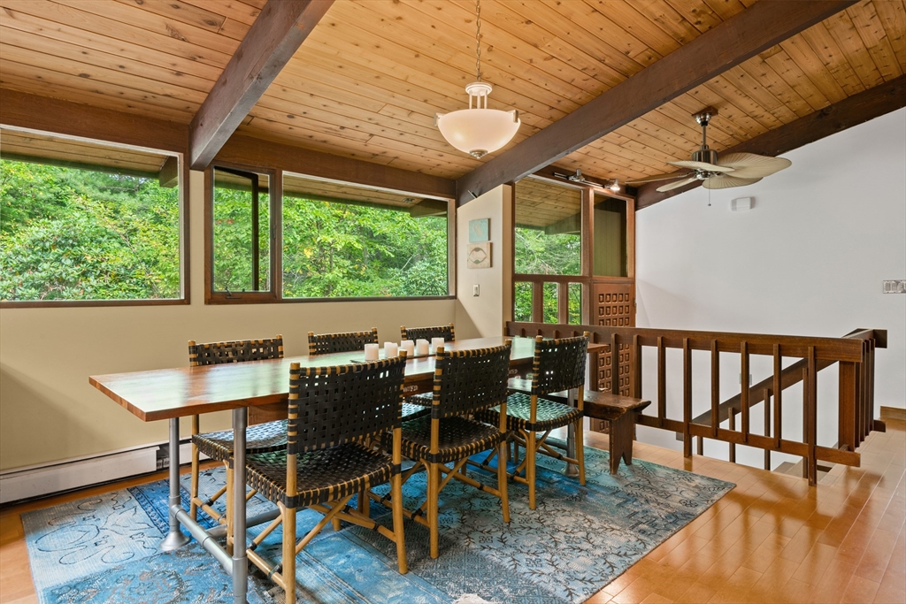 4 Plum Hill Manchester, MA 01944 - Photo 14 of 39 a view of a dining room with furniture window and outside view