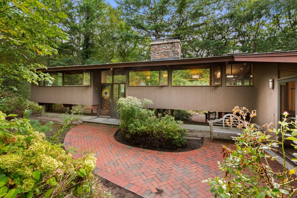 4 Plum Hill Manchester, MA 01944 - Photo 2 of 39 front view of a house with a yard