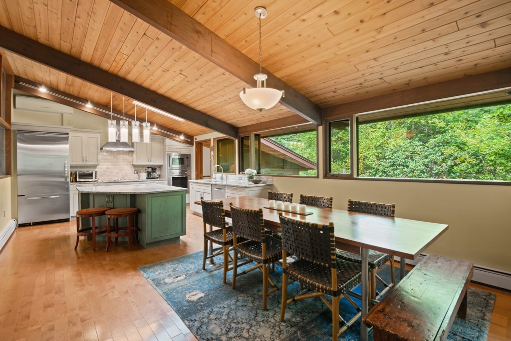 4 Plum Hill Manchester, MA 01944 - Photo 7 of 39 a view of a dining room with furniture window and outside view