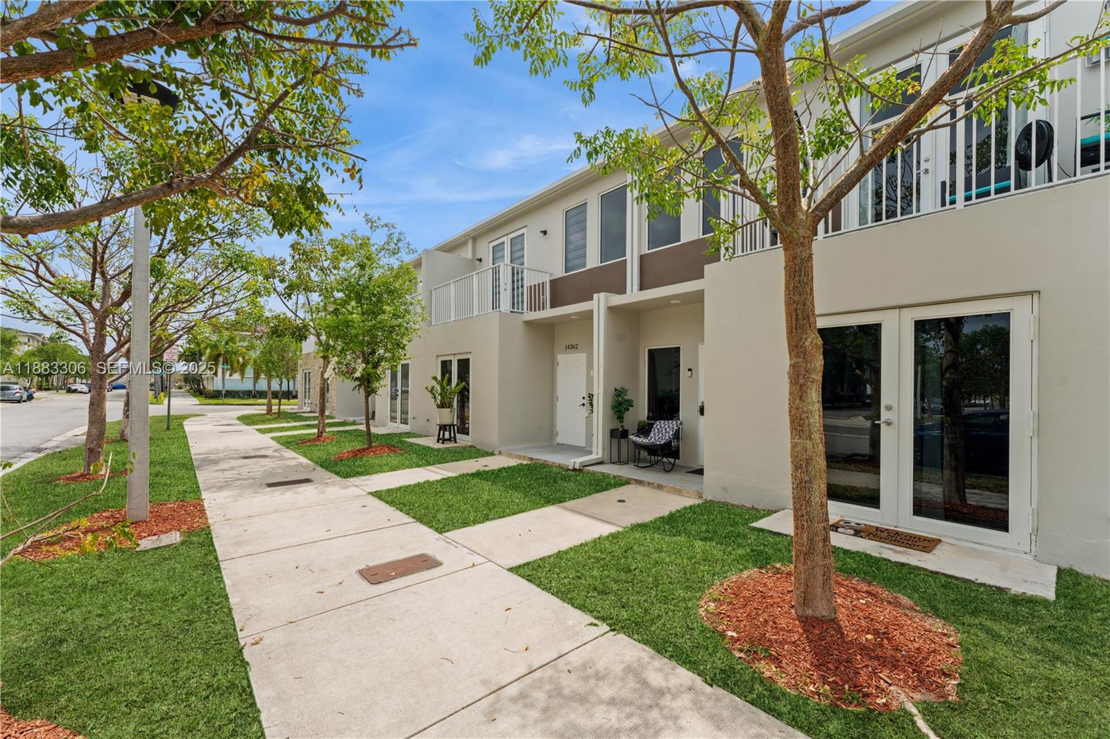 a house with garden in front of it