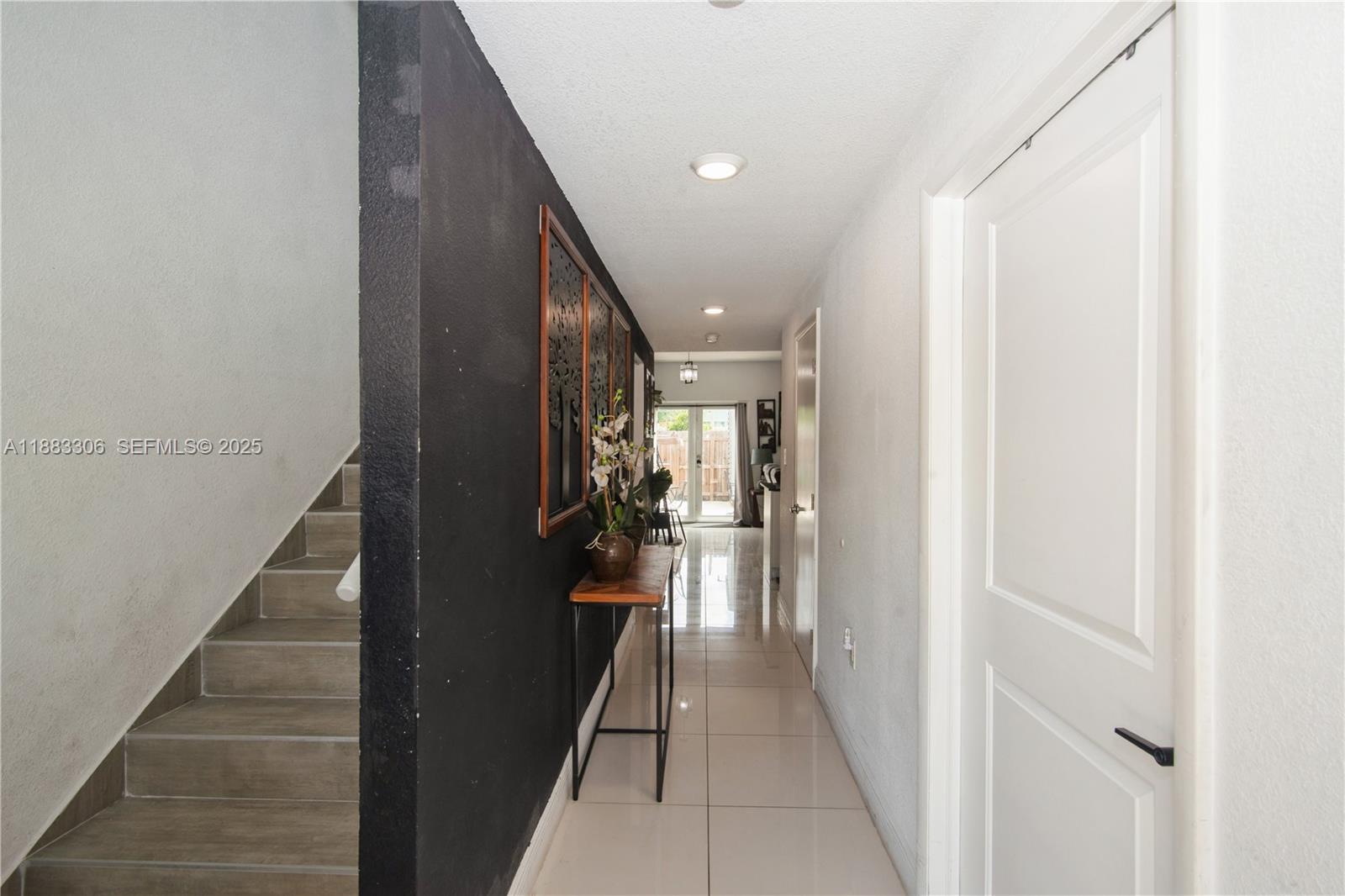 14366 Southwest 258th Lane Homestead, FL 33032 - Photo 3 of 24 a view of hallway with stairs