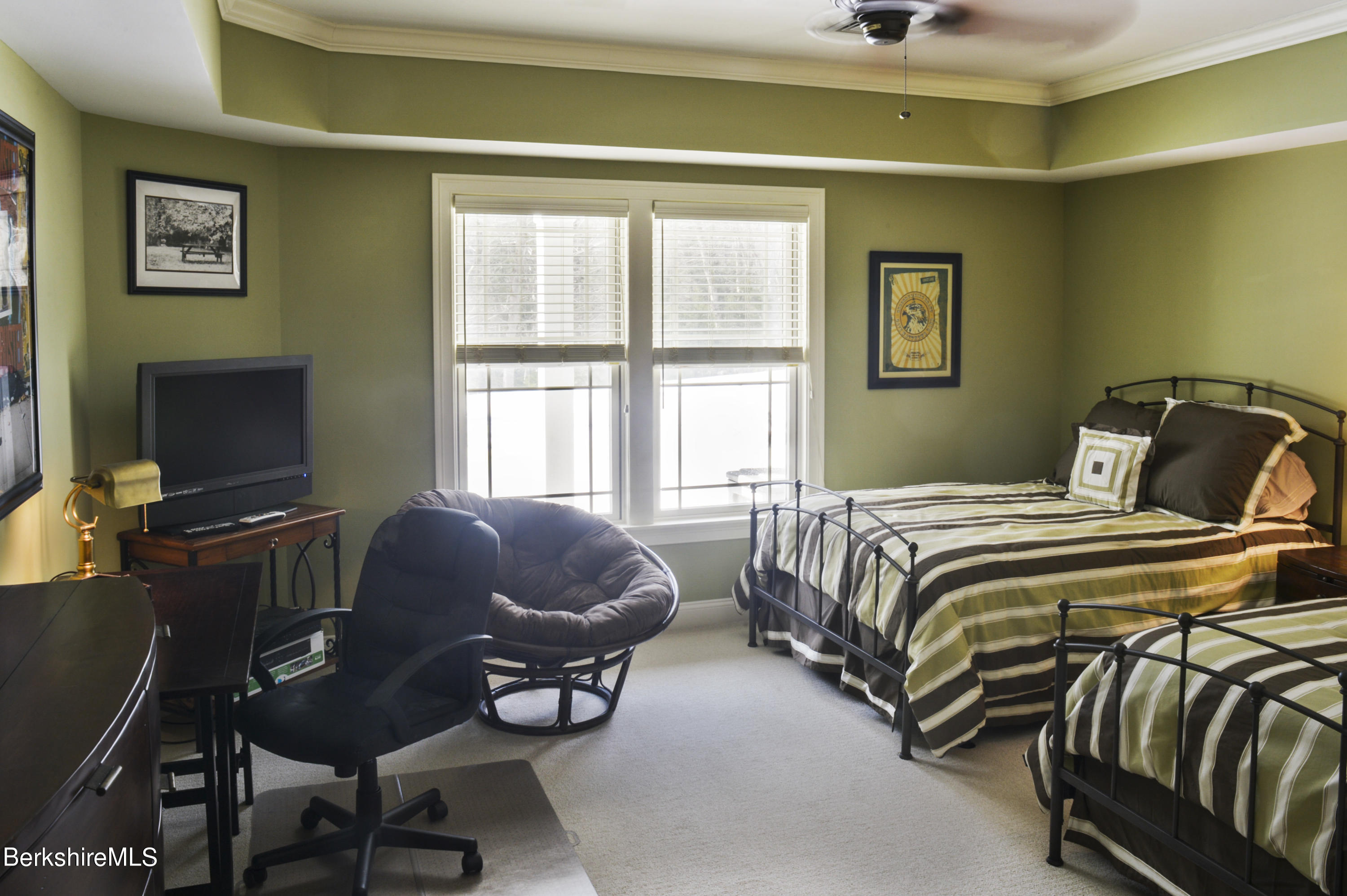 249 Woodmere Road Becket, MA 01223 - Photo 13 of 23 a bedroom with a bed and wooden floor