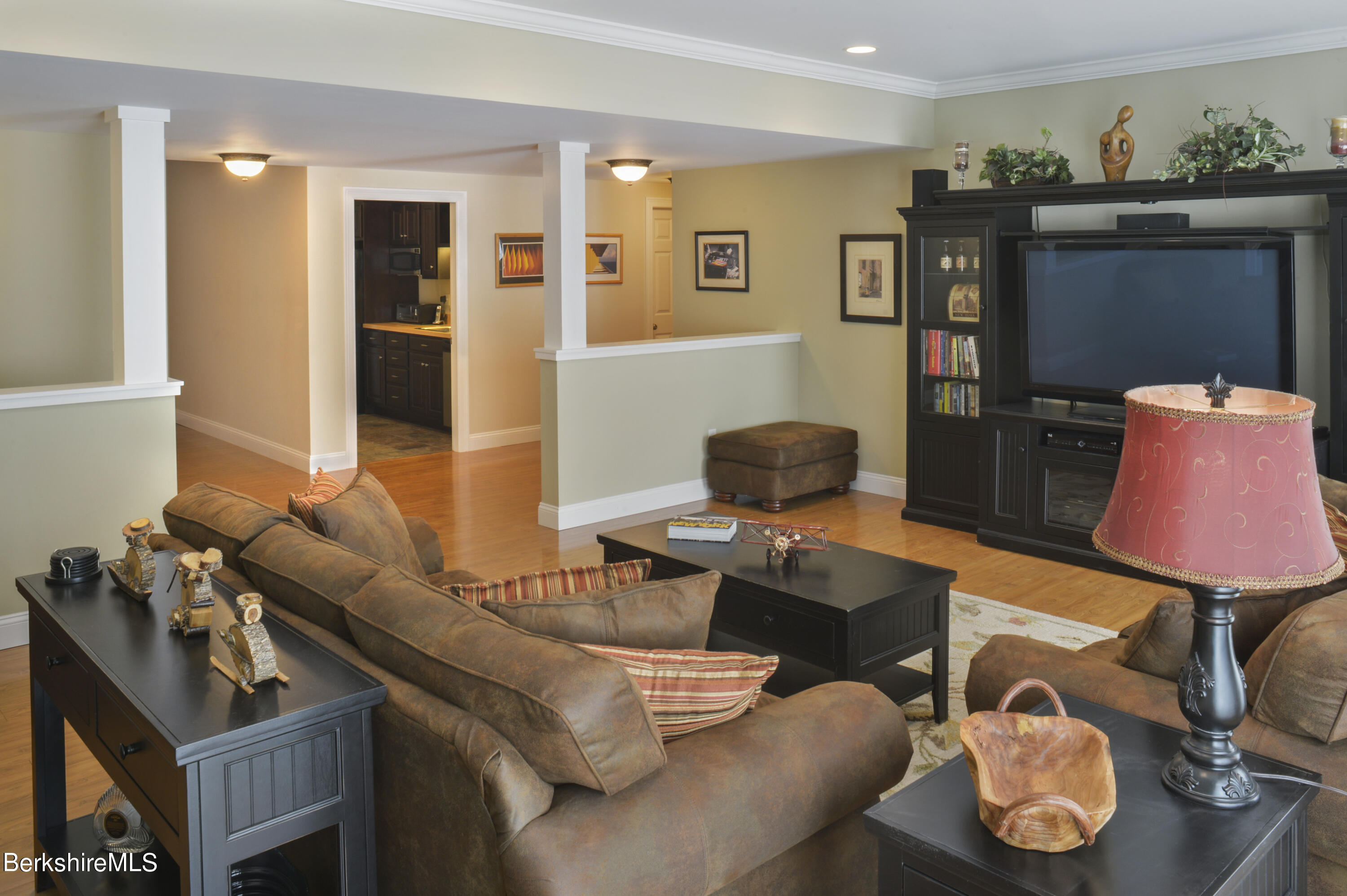 249 Woodmere Road Becket, MA 01223 - Photo 15 of 23 a workspace with furniture and lamp