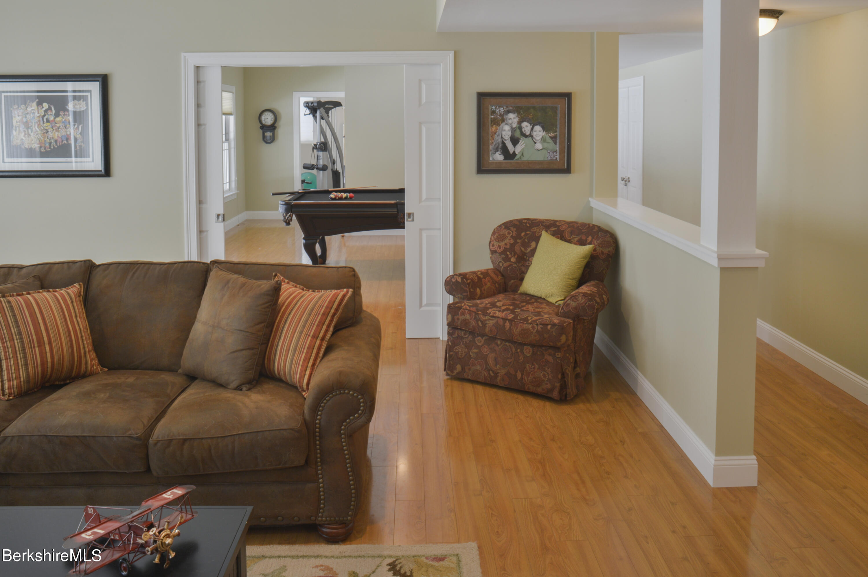 249 Woodmere Road Becket, MA 01223 - Photo 17 of 23 a living room with furniture and a couch