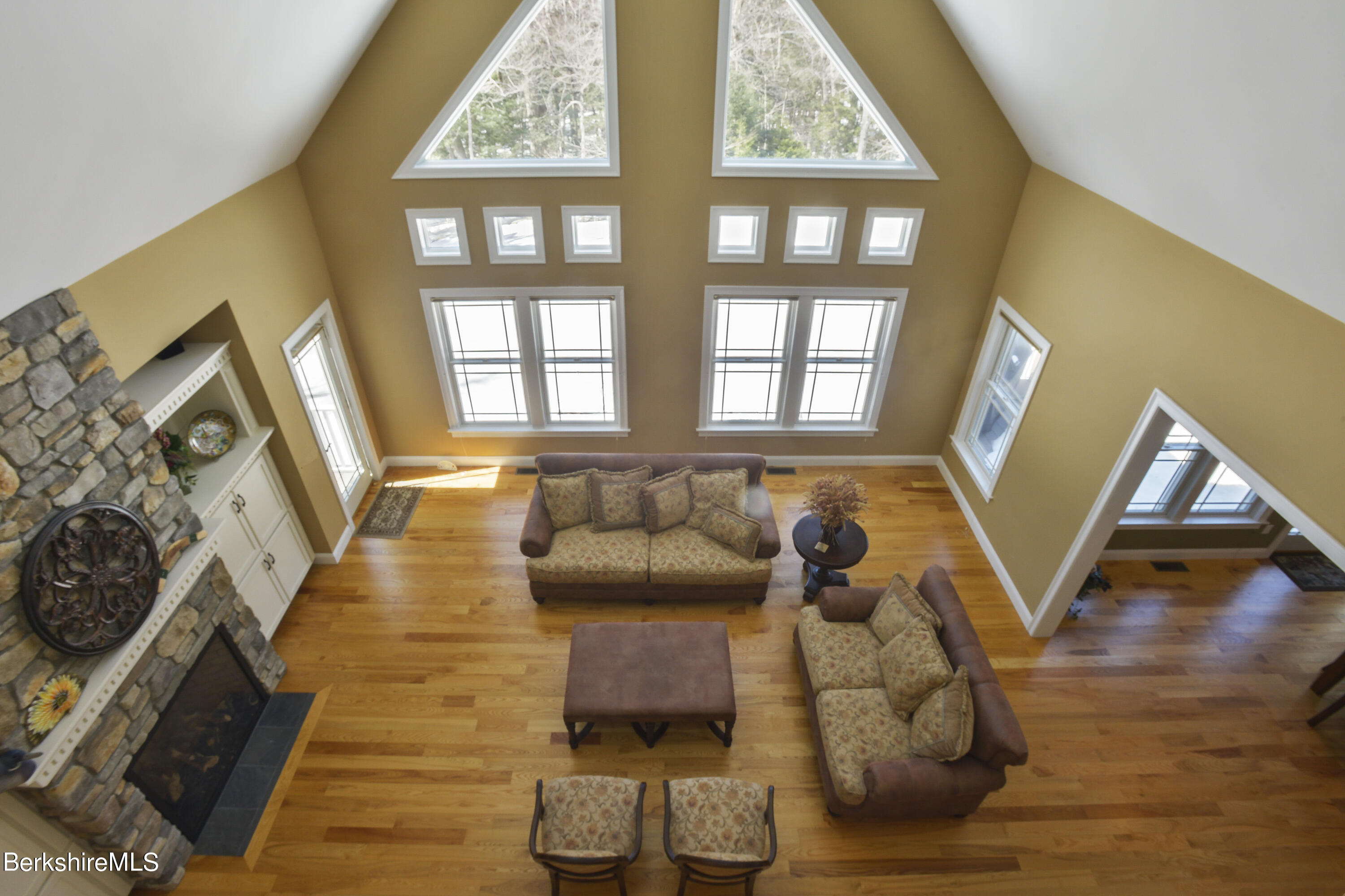 249 Woodmere Road Becket, MA 01223 - Photo 4 of 23 a living room with furniture and a large window