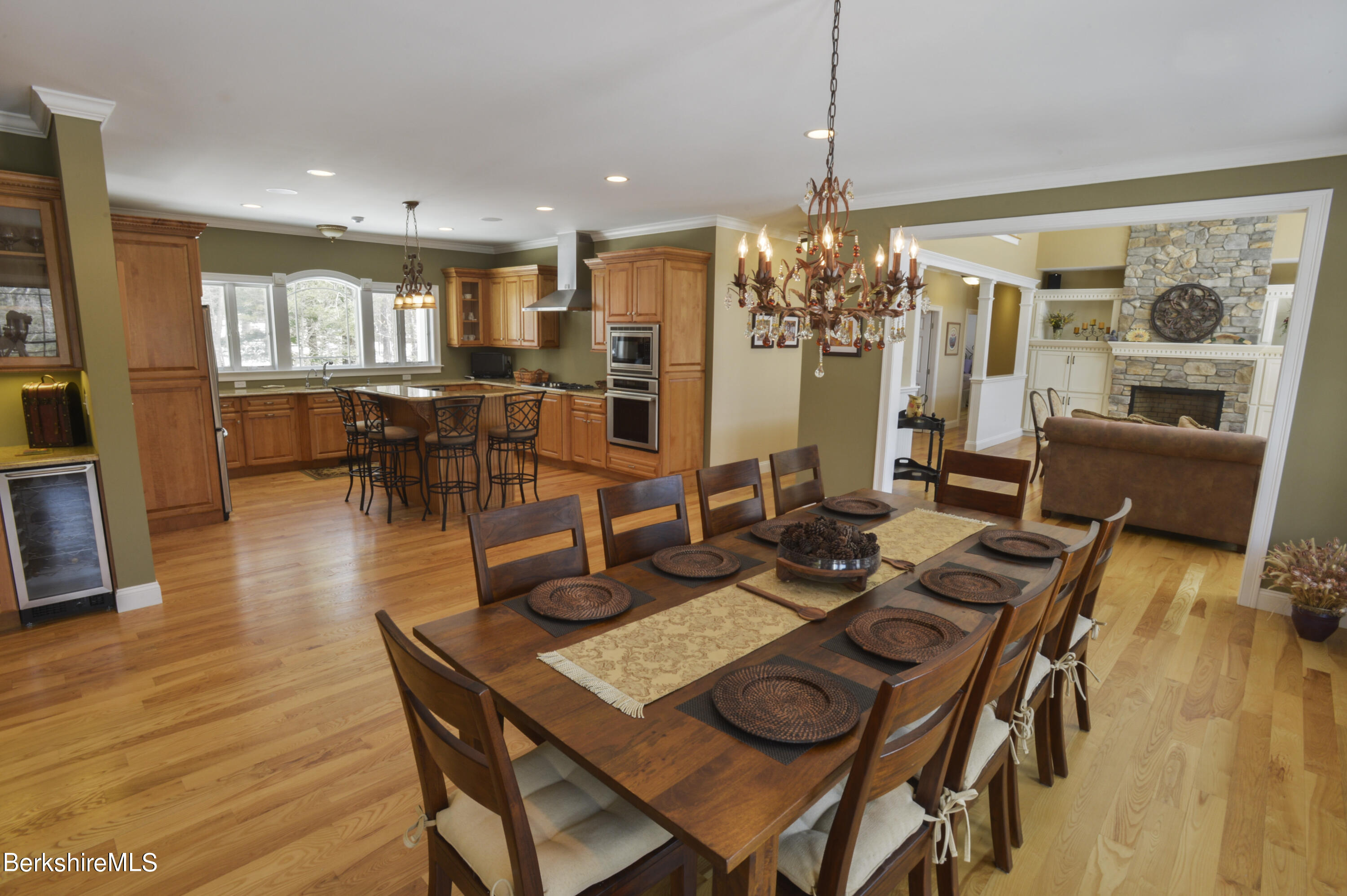 249 Woodmere Road Becket, MA 01223 - Photo 5 of 23 a view of a dining room with furniture window and wooden floor