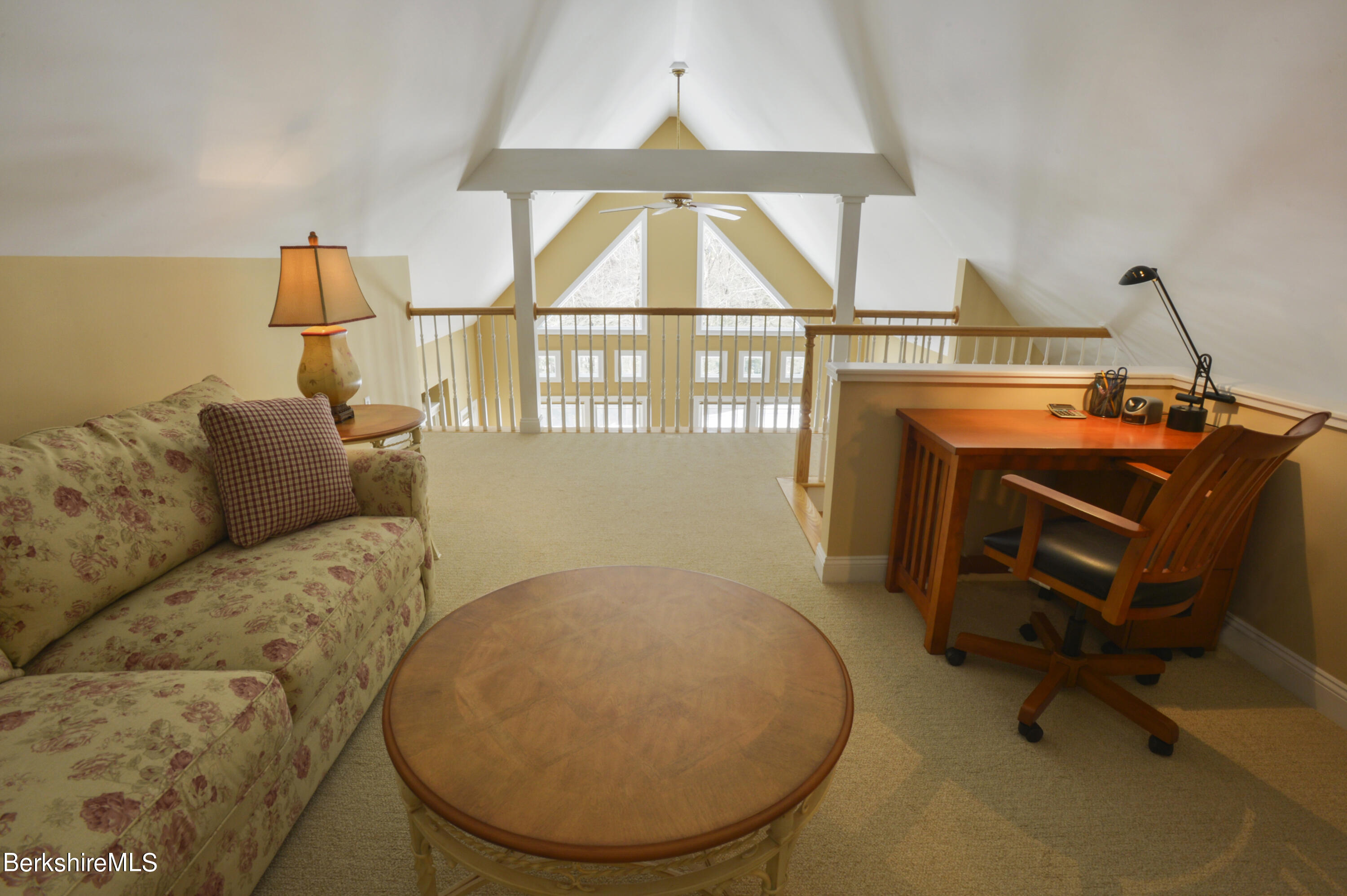 249 Woodmere Road Becket, MA 01223 - Photo 8 of 23 a workspace with furniture and a window