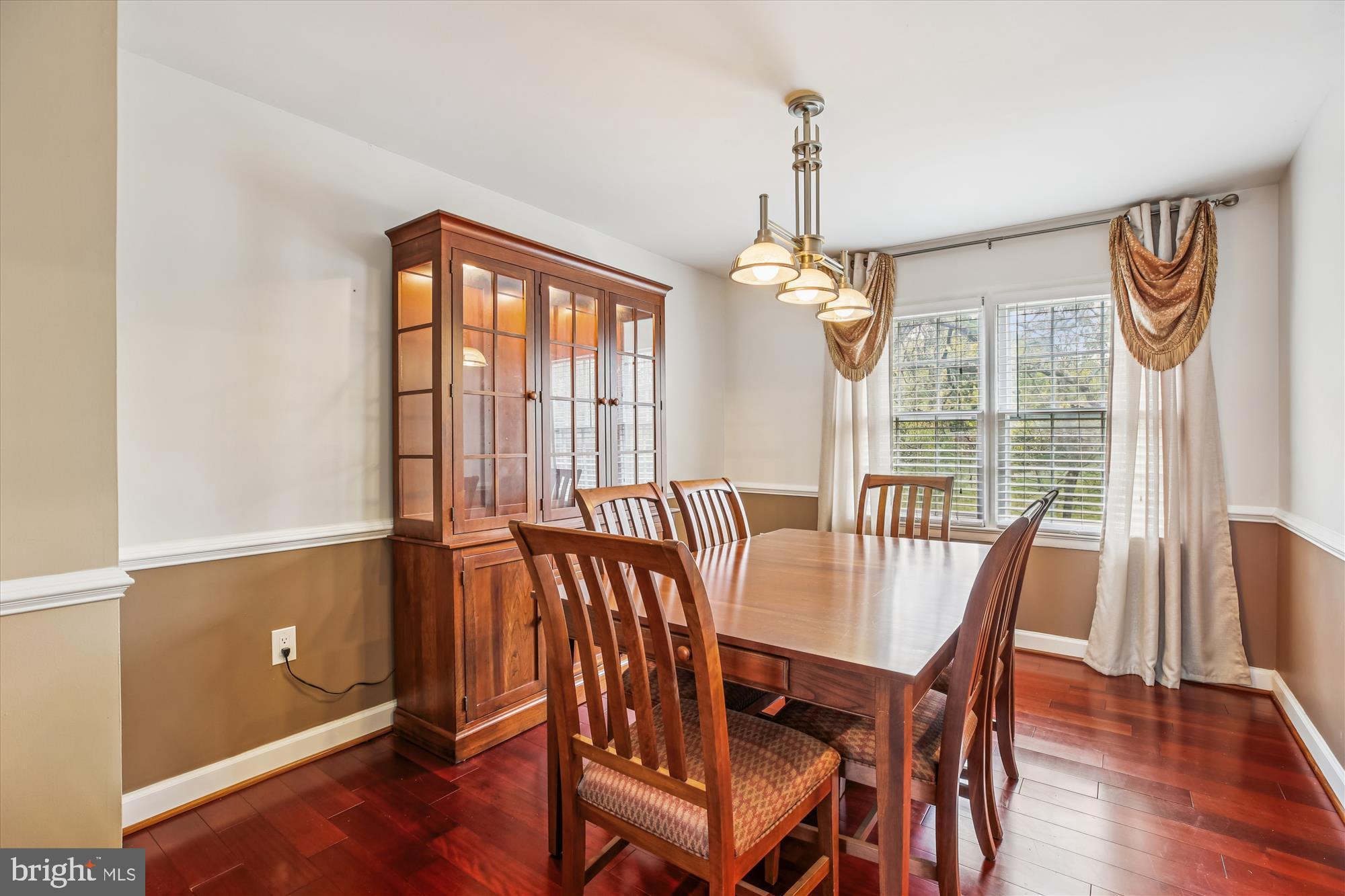 2702 Atlanta Drive, Unit 72702 Silver Spring, MD 20906 - Photo 11 of 55 a view of a dining room with furniture window and wooden floor