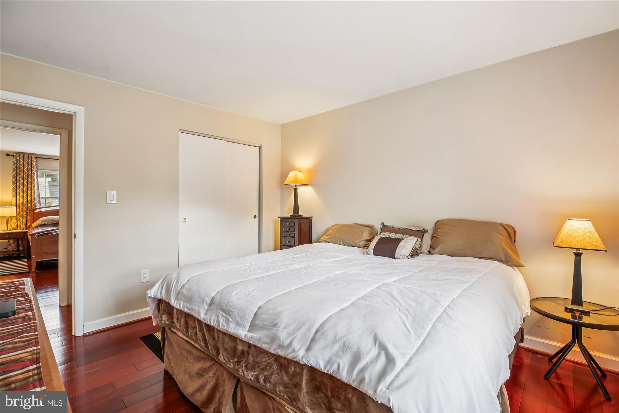 2702 Atlanta Drive, Unit 72702 Silver Spring, MD 20906 - Photo 28 of 55 a bedroom with a bed and a lamp