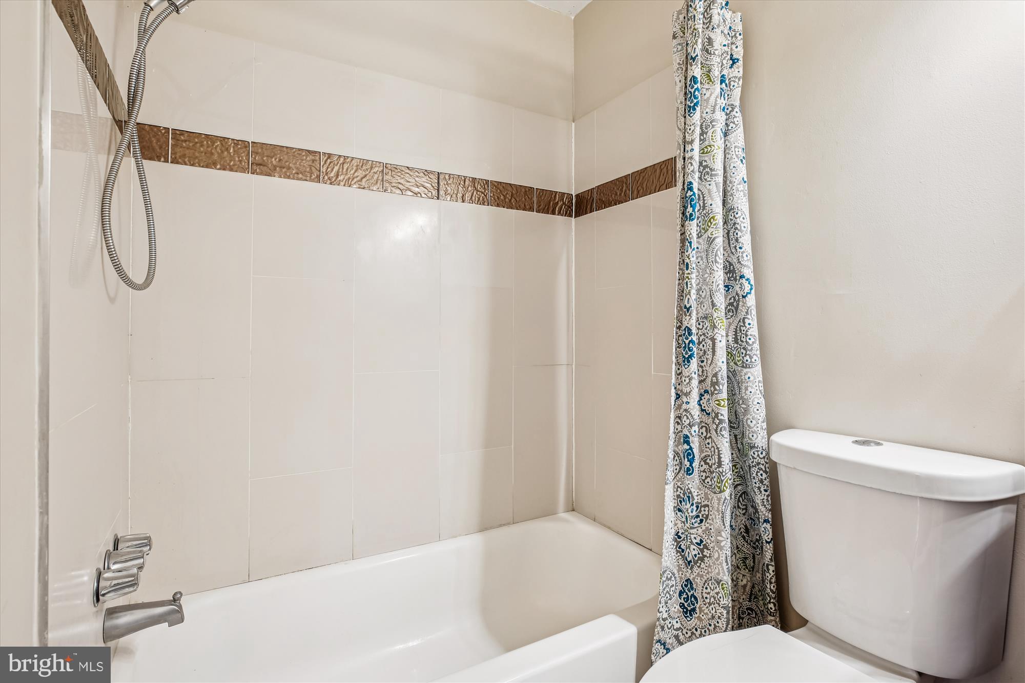 2702 Atlanta Drive, Unit 72702 Silver Spring, MD 20906 - Photo 34 of 55 a bathroom with a toilet and a shower